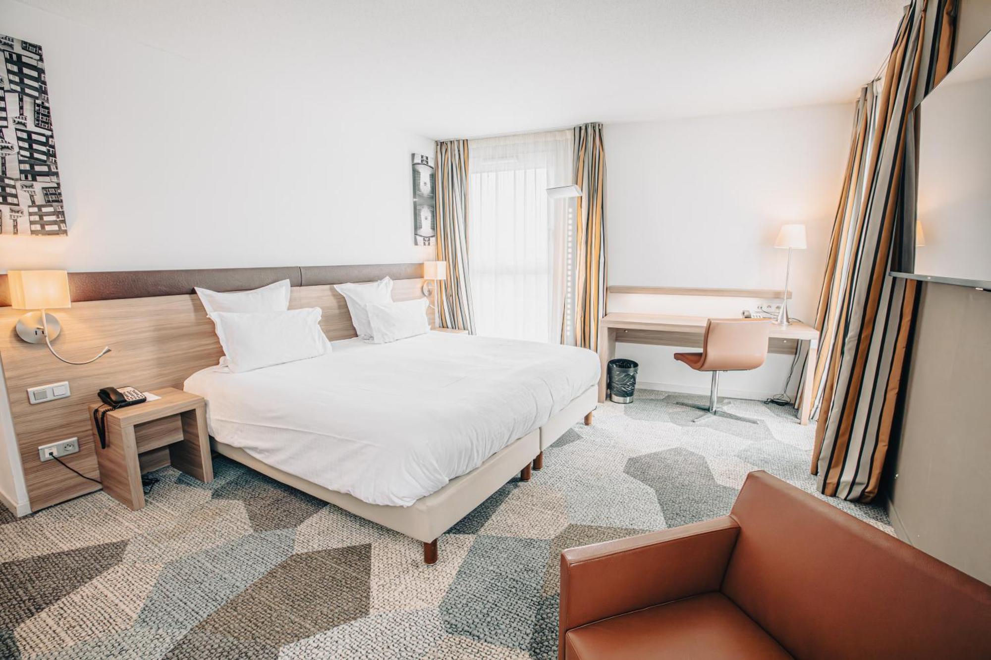 Holiday Inn Mulhouse By Ihg Bagian luar foto